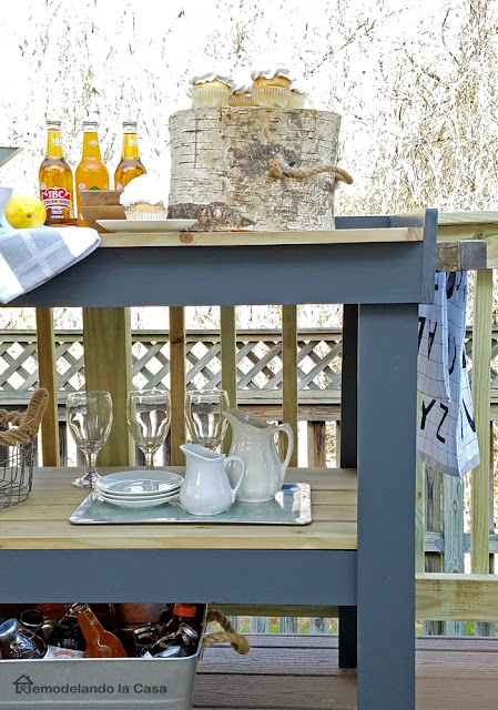 floating deck with grey serving cart - entertainment station