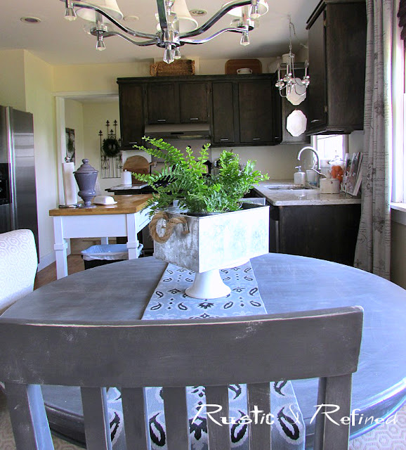 Home Tour of an updated kitchen with ebony stained cabinetry, an eat-in kitchen table and functional butlers pantry.