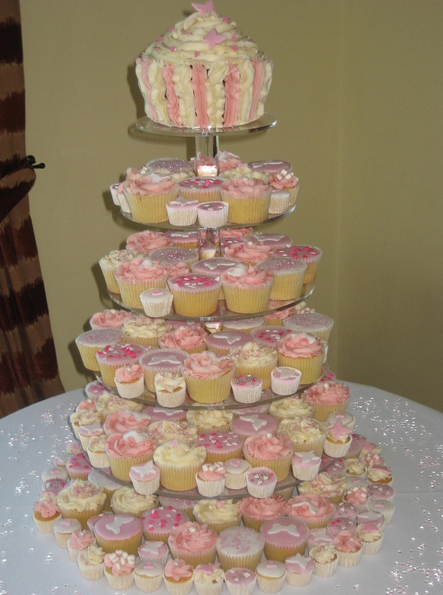 The following amazing pink cupcake towers for wedding comes from The Suffolk