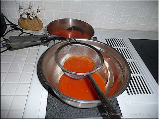 straining the habanero fire sauce