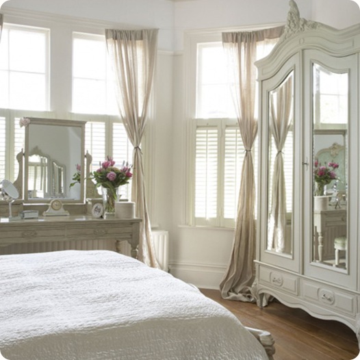 White bright airy bedroom bay window sheer curtains bed armoire wardrobe real home CH&I 03/2008 pub orig 