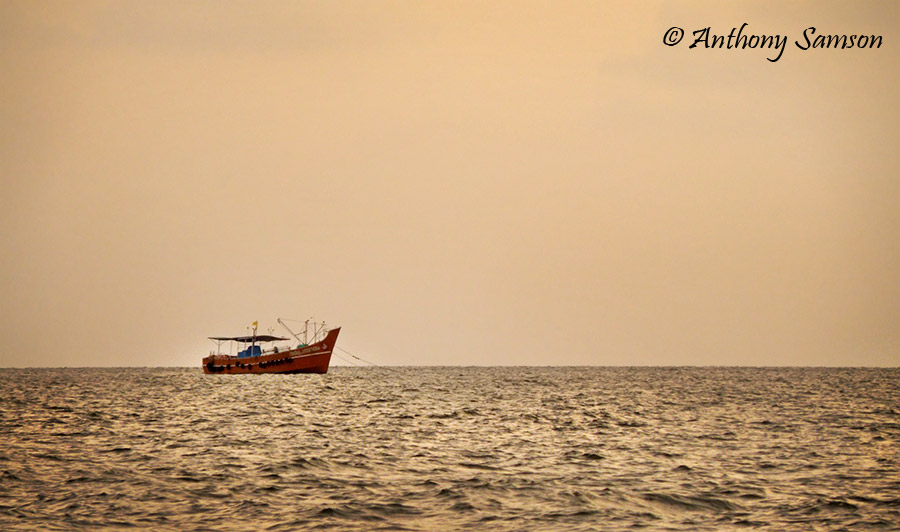 ship anchored in middle of the sea in alleppy