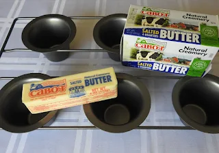 butter placed on top of popover pan