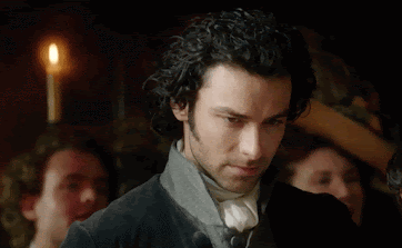 Ross Poldark looks up as Elizabeth and Francis stare happily at each other at their wedding