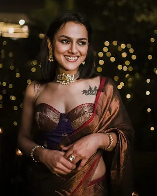 Shraddha Srinath stunning in modern outfits, showcasing her elegant style and fashion versatility.