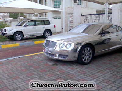 a Chrome Bentley GT in Abu Dhabi City the Capital of UAE with mirror 