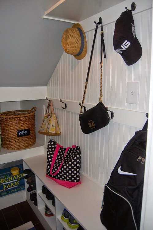 under the stairs mud room