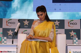 Gorgeous Jacqueline Fernandez  in yellow saree 09.JPG