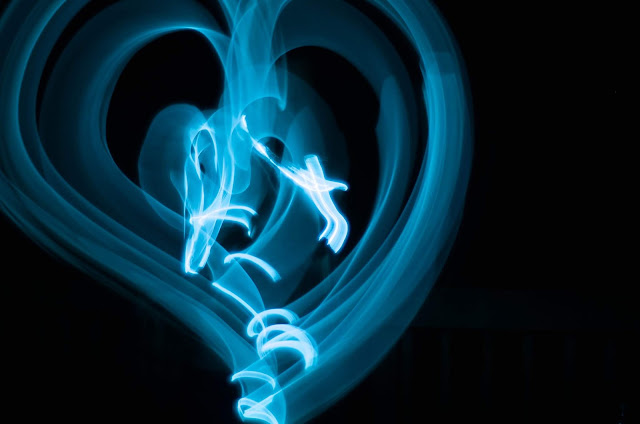 A light painting of a blue heart