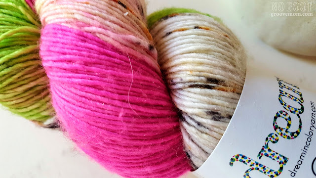 Preppy pinks and greens create a bright speckled and tonal yarn.