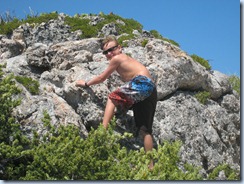 Noah climbing at Tintemarre