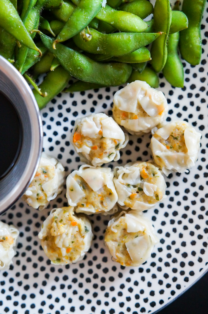 Trader Joe's Chicken Shu Mai with edamame pods on polka dot plate