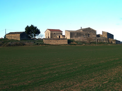 Vista de llevant de Cal Magí de les Alzines des del Camí de l'Espelt