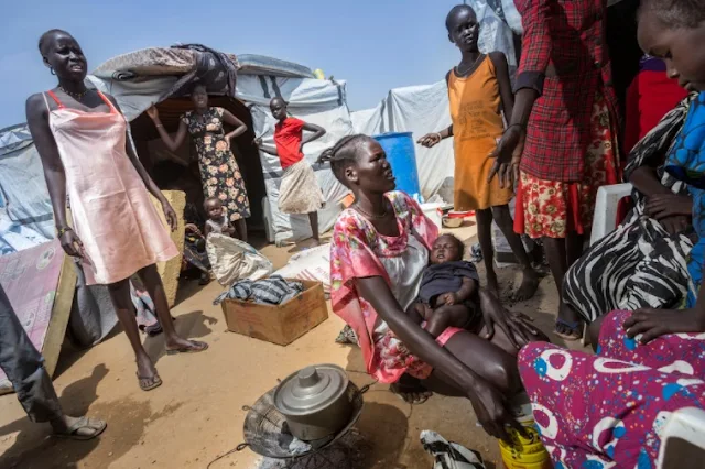 Cooking on a small charcoal grill in Juba South Sudan