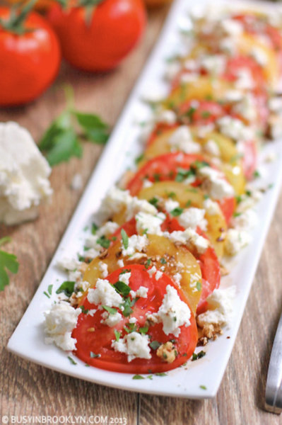 Summer Tomato Feta Salad @ BusyInBrooklyn.com, another Pretty Way to Serve Tomatoes @ AVeggieVenture.com.