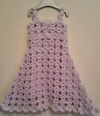 http://www.ravelry.com/patterns/library/free---diamond-pattern-toddler-dress-crochet-pattern