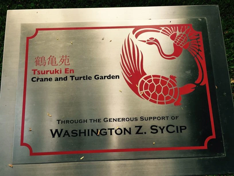 Crane and Turtle Garden marker in Washington SyCip Park