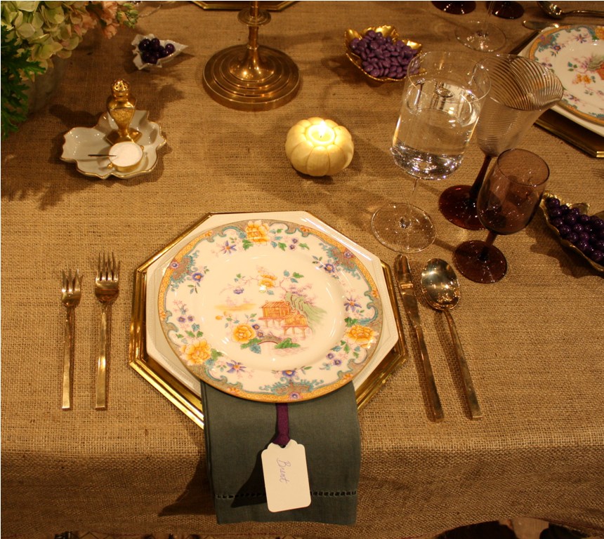 I love the simple burlap tablecloth mixed with vintage brass candelabras 