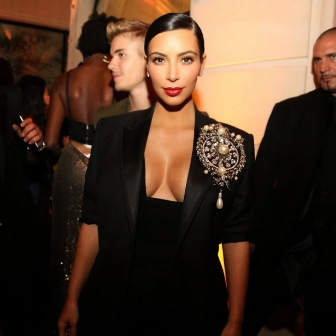 Kim Kardashian flaunts a plunging neckline at the CR Fashion Book #5 Paris Launch Party