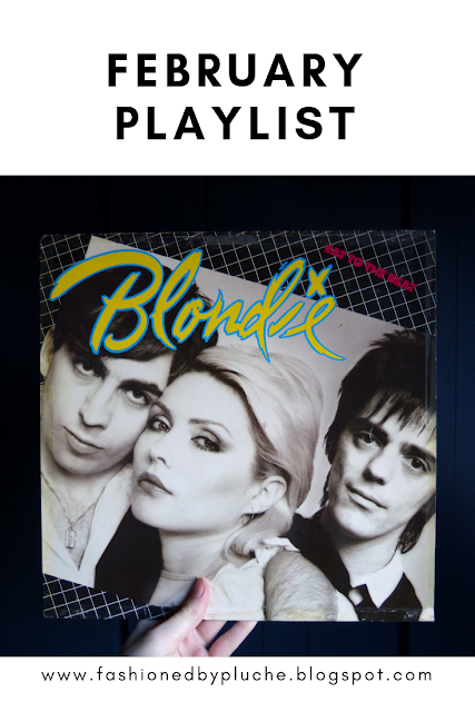 This picture depicts someone holding up a vinyl of Blondie Eat To The Beat album. On top of the picture it states "February Playlist" and at the bottom "www.fashionedbypluche.blogspot.com".