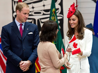 William and Kate, the Duke and Duchess of Cambridge greet a new Canadian citizen during a citizenship ceremony Friday, July 1, 2011, in Gatineau, Canada.