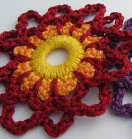 http://www.mycrochetprojects.com/blog-content/uploads/2012/07/The-second-paradise-flower.pdf