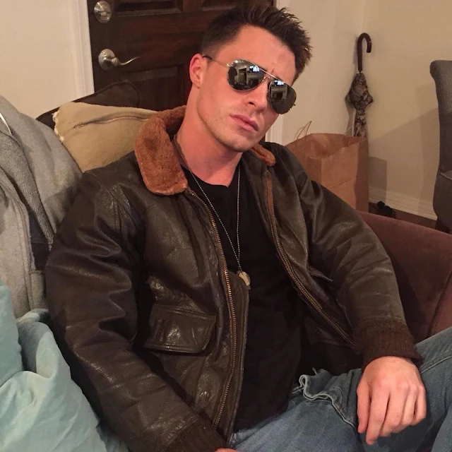 Sexy Dude Wearing sunglasses and brown bomber Leather Jacket