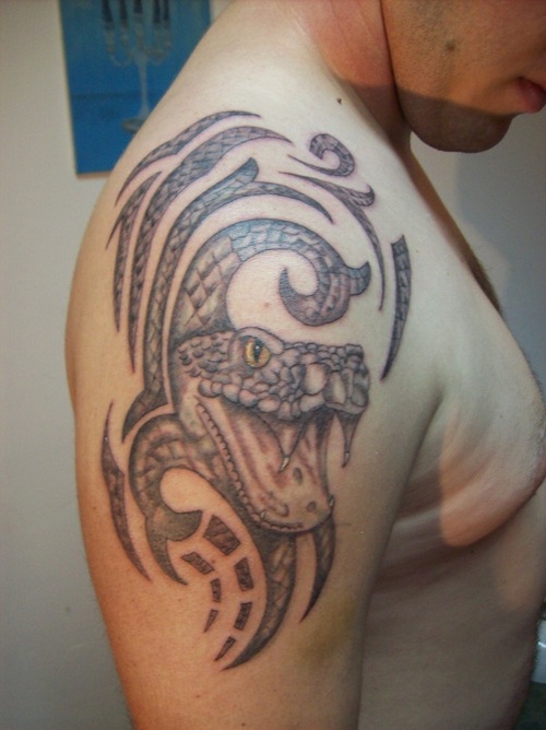 snakes tattoo. Snake Tattoo Designs
