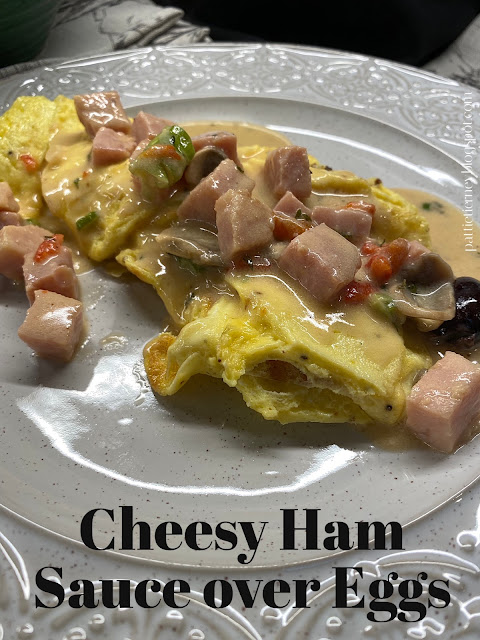Cheesy%20Ham%20Sauce%20over%20Eggs.PNG