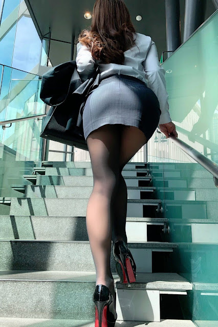 Woman in miniskirt and pantyhose