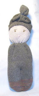 folk art sock doll embroidered eyes winter hat