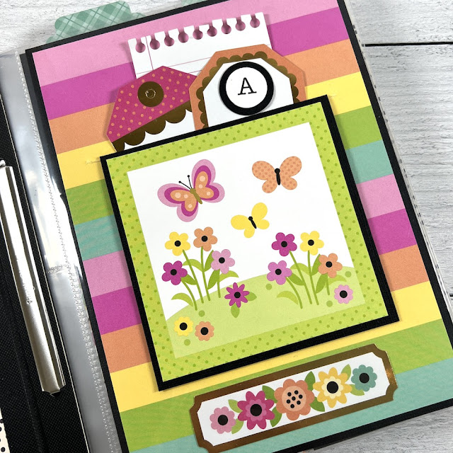 A to Z Scrapbook Album page with butterflies, flowers, and a pocket with journaling cards