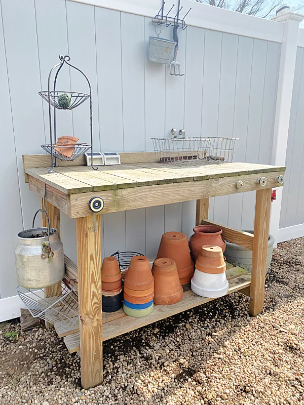 potting bench with terra cotta pots