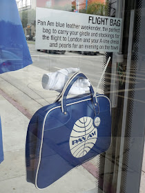 Pan Am flight bag bus shelter installation