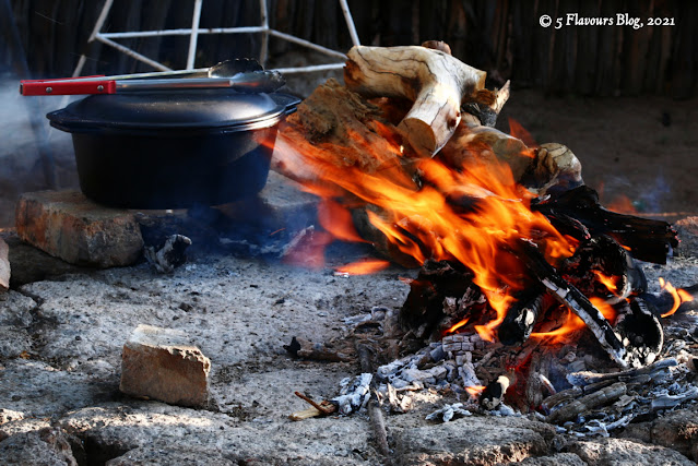 Pot Bread Cooking By An Open Fire