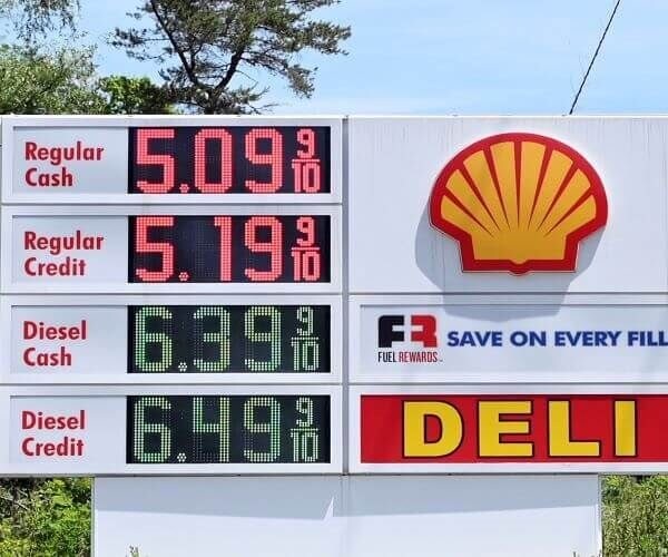 US gasoline average price tops $5 per gallon in historic first