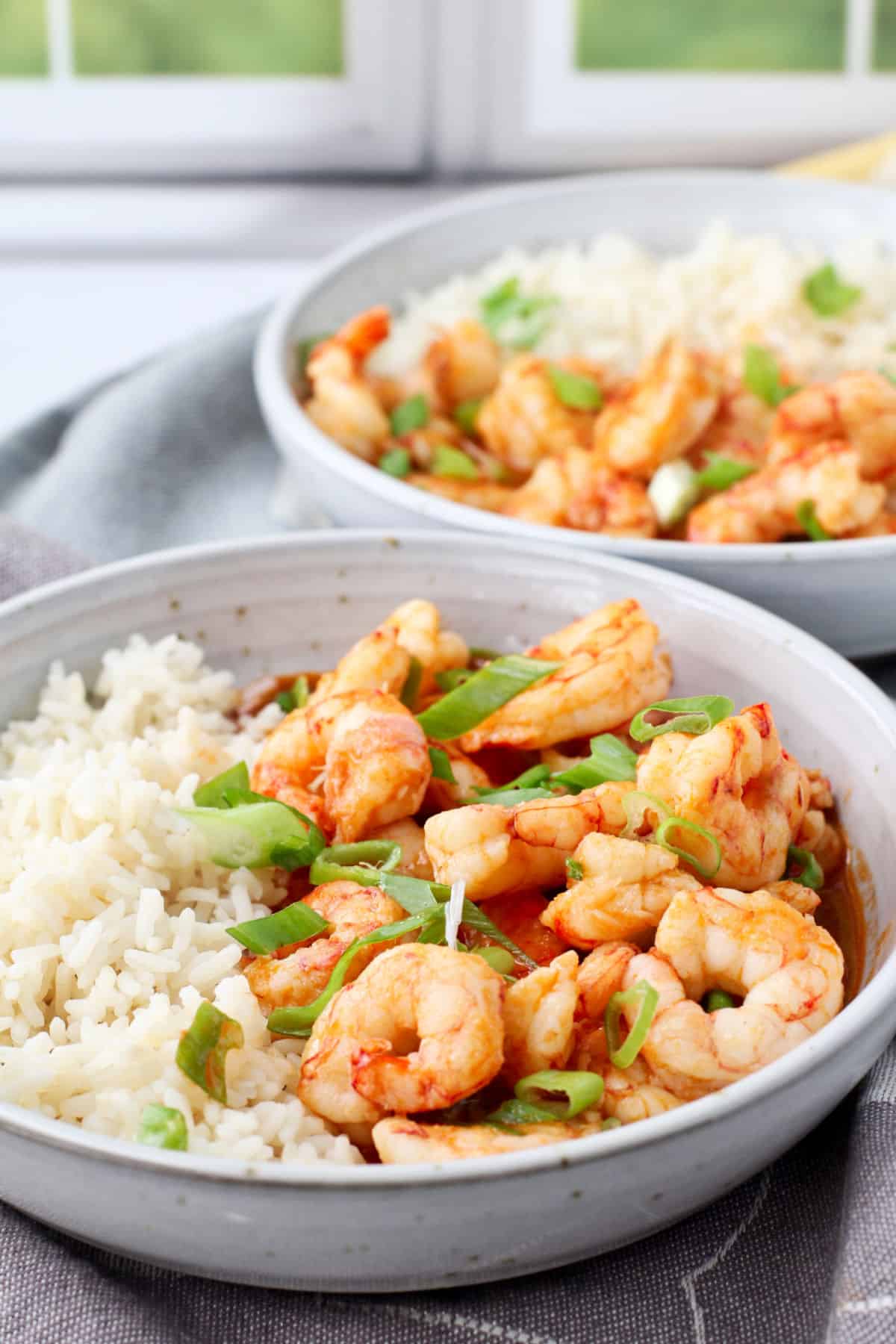 Singapore-Style Chili Garlic Shrimp and Rice in a white bowl.