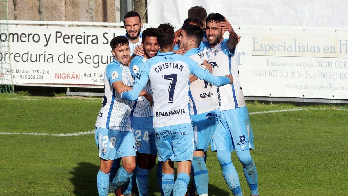 Les joueurs de Malaga célébrant un but contre Coruxo, Copa del Rey
