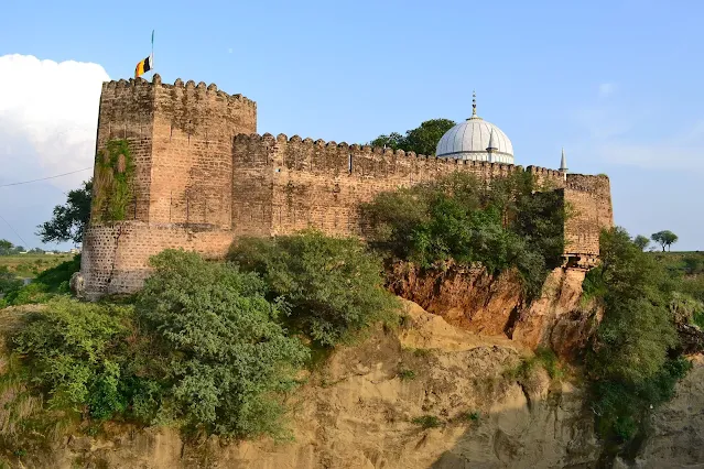 Visit the Kallar Syedan Fort.