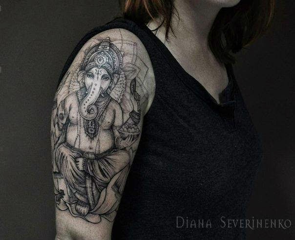 Whitish Women Lord Ganesh Tattoo, Lord Ganesh Tattoo On Women Back, Women Lord Ganesh Tattoo Designs, Black Colored Ganesh Spiritual Tattoo, Women, Artist, Parts,