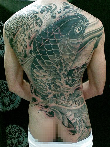 koi fish tattoo design on the back body for men
