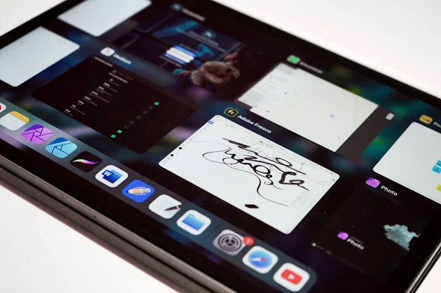 Detailed view of the 2024 iPad Pro displaying multiple open apps, showcasing the multitasking capabilities of iPadOS.