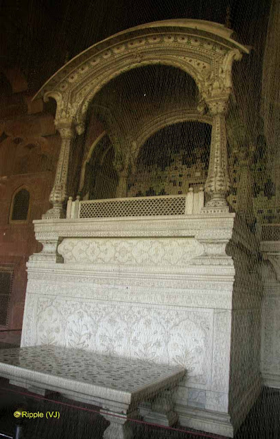 RED FORT: Diwan-i-Am or Hall of Public Audience is situated in the Red Fort of         Delhi. It originally had a courtyard on its front and was richly         ornamented with gilded stuccowork. Heavy curtains graced the main hall,         which were three bays in depth.