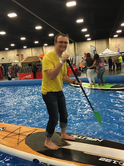 Ben on a paddle board