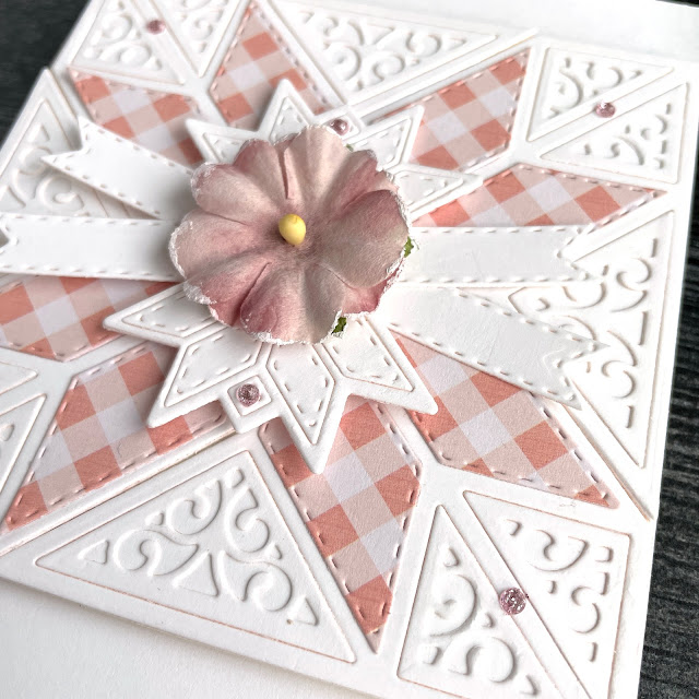 Pastel Quilt card created with: Spellbinders home sweet quilt filigree 8 point star die; Scrapbook.com boho patterned paper; Pinkfresh blush glitter drops; Prima sharon ziv paper flower