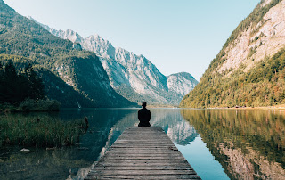 Mountains reflected in a lake by S Migaj