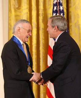 Stan Lee is congratulated by President George W. Bush on receiving the National Medal of Arts in 2008.