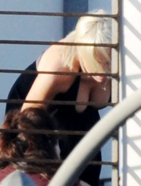 Lindsay Lohan Showing Cleavage Candids While Partying On Rooftop