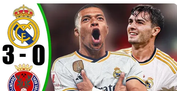 Image of Real Madrid players celebrating a goal: "Real Madrid players celebrate Fede Valverde's opening goal against Deportiva Minera during the Copa del Rey 2025 match