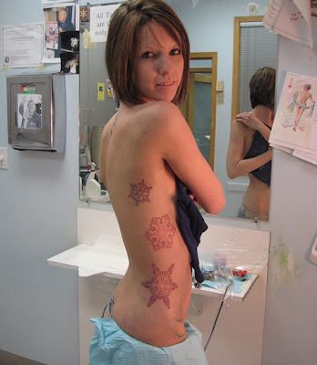 extreme rib cage tattoos